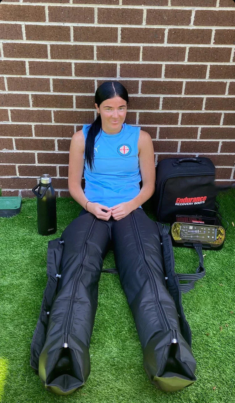 Athlete using Endurance Recovery Boots outdoors