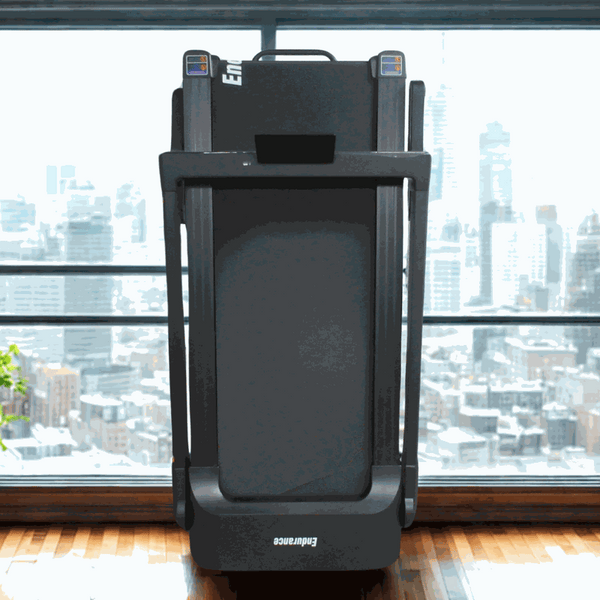 Endurance Athlete Treadmill folded upright for compact storage in apartment